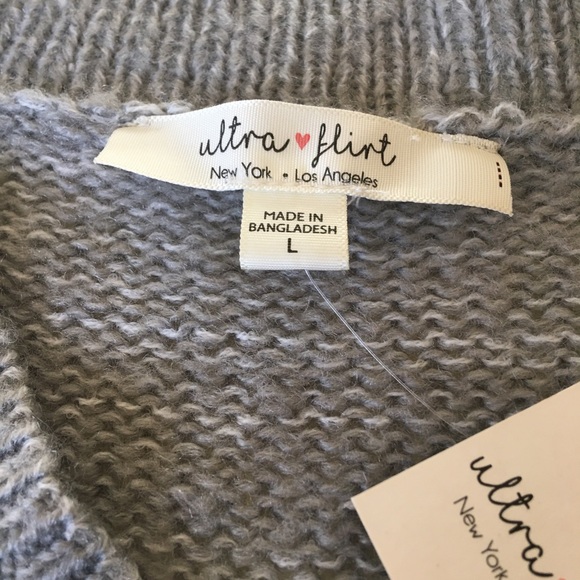 Gray V-neck sweater with stripes on sleeves. - Picture 3 of 4